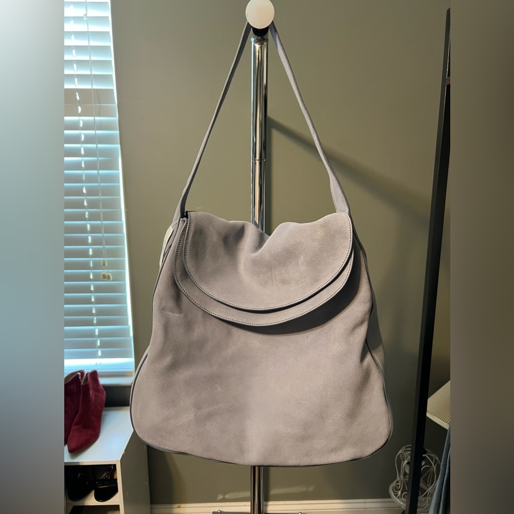 Prada suede flap hobo bag. Luxury. New with tags. Never used.